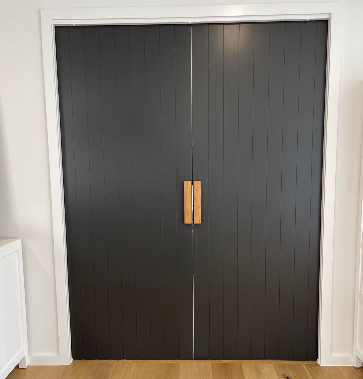 Black and Timber Entrance Door to attract and welcome guests