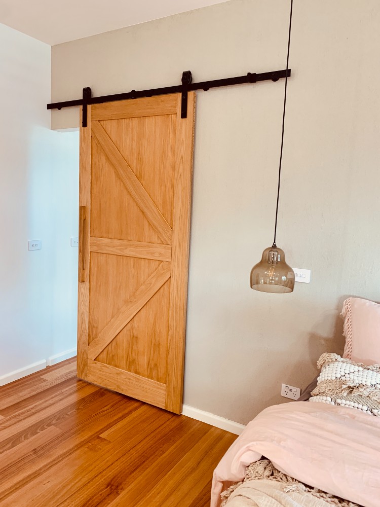 Stylish, Rustic and wonderful barn door perfectly matched with a wooden handle