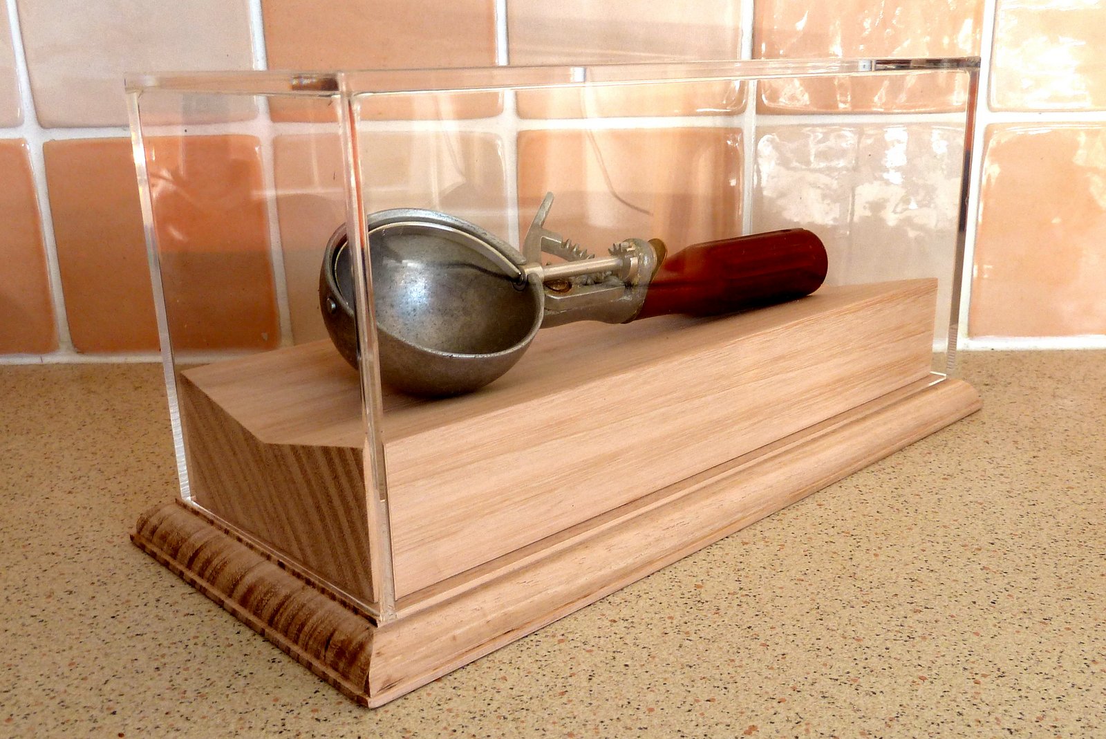 Display case for sentimental ice cream scoop